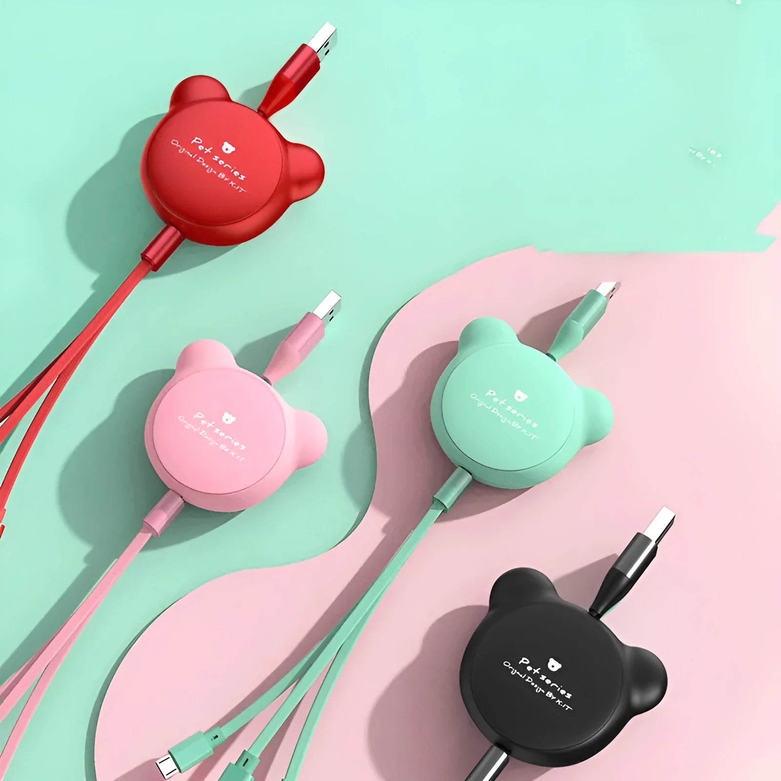 Telescopic bear figure organising red, pink, black, and green Mini USB, 30PIN, and Micro USB data cables.