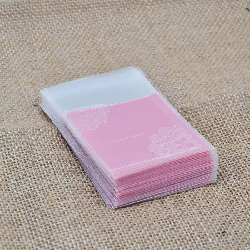 Pink self-adhesive plastic bag with resealable flap for packaging handmade soap, shown sealed.