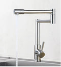 Silver stainless steel kitchen tap with dual handles and 360-degree rotating spout