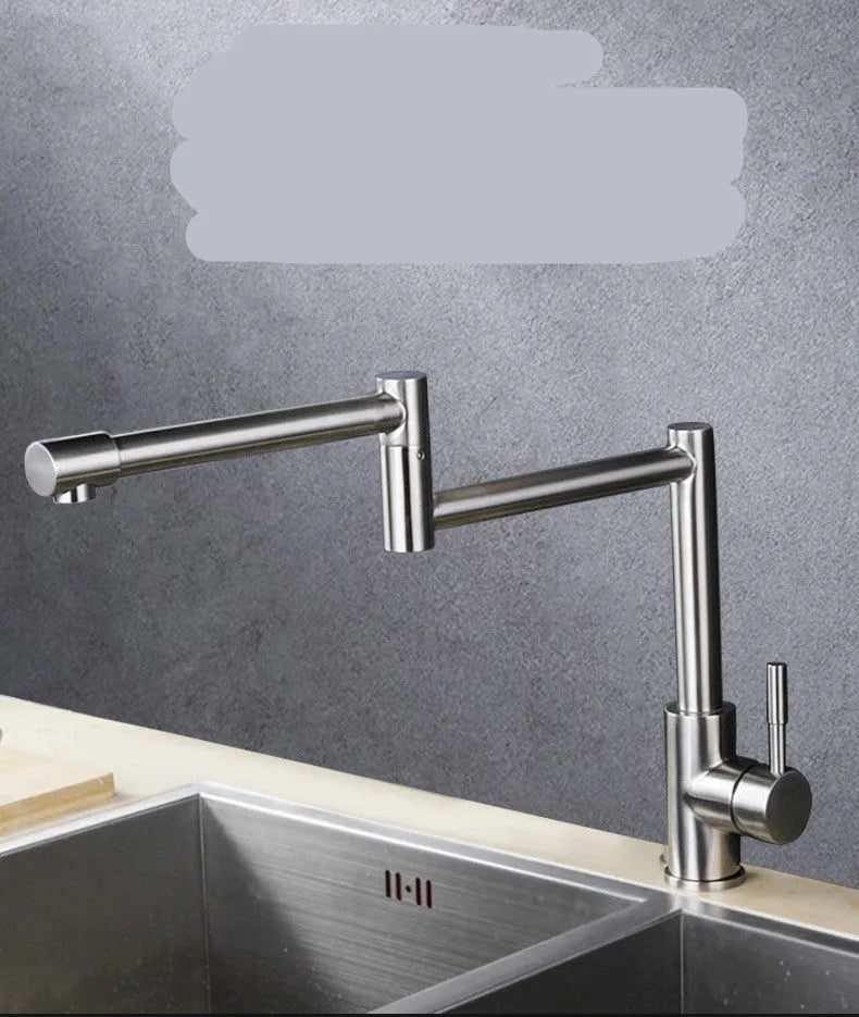 Silver stainless steel kitchen tap with dual handles and 360-degree rotating spout