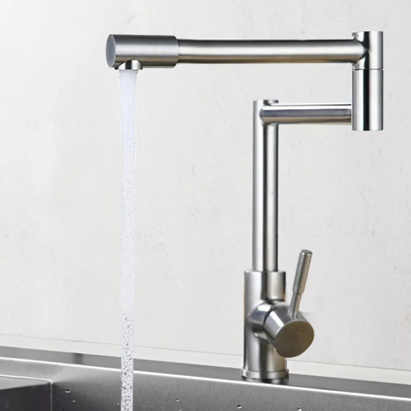 Silver stainless steel kitchen tap with dual handles and 360-degree rotating spout