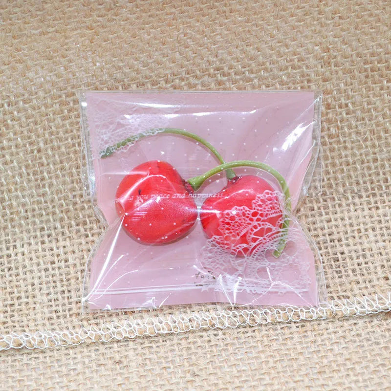 Pink self-adhesive plastic bag with resealable flap for packaging handmade soap, shown sealed.