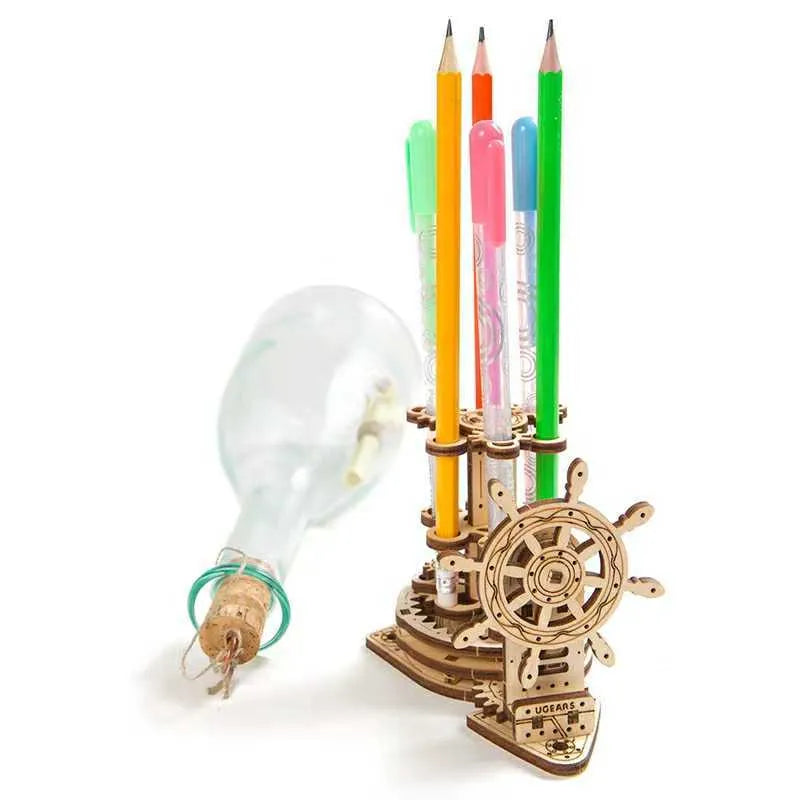 Ukrainian wooden machinery model pen holder with rotating base and 12 slots, in photo-colour finish.