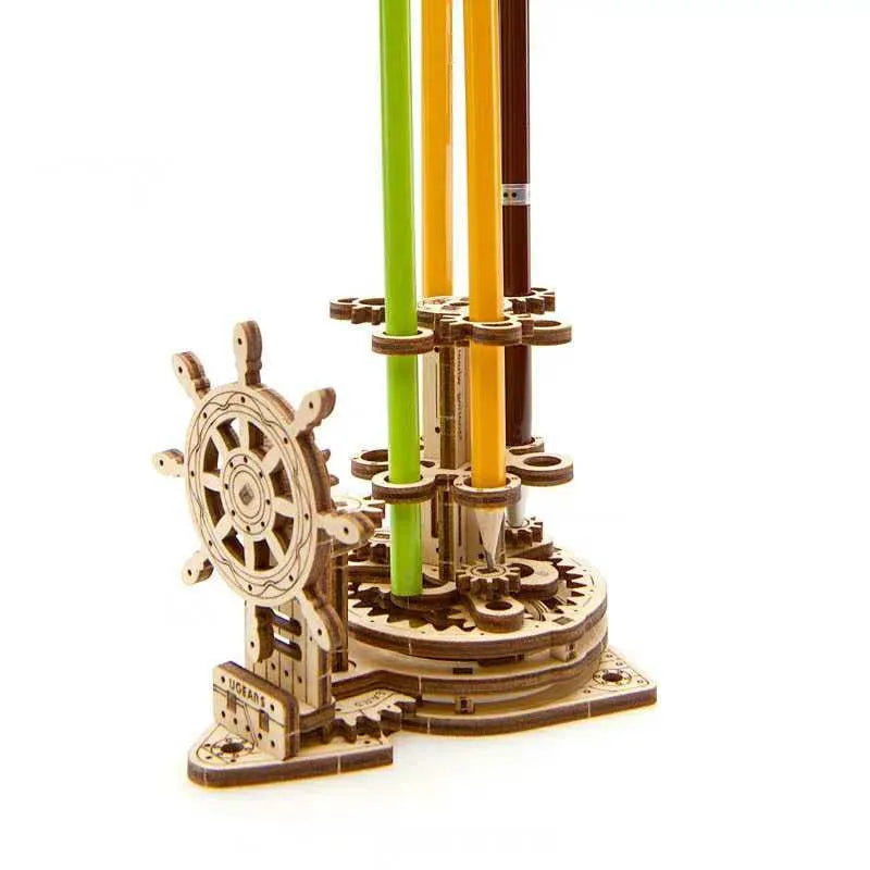 Ukrainian wooden machinery model pen holder with rotating base and 12 slots, in photo-colour finish.