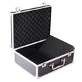 Black aluminium tattoo equipment case open, showing grey foam insert with custom-cut compartments for needles, inks, and machines.