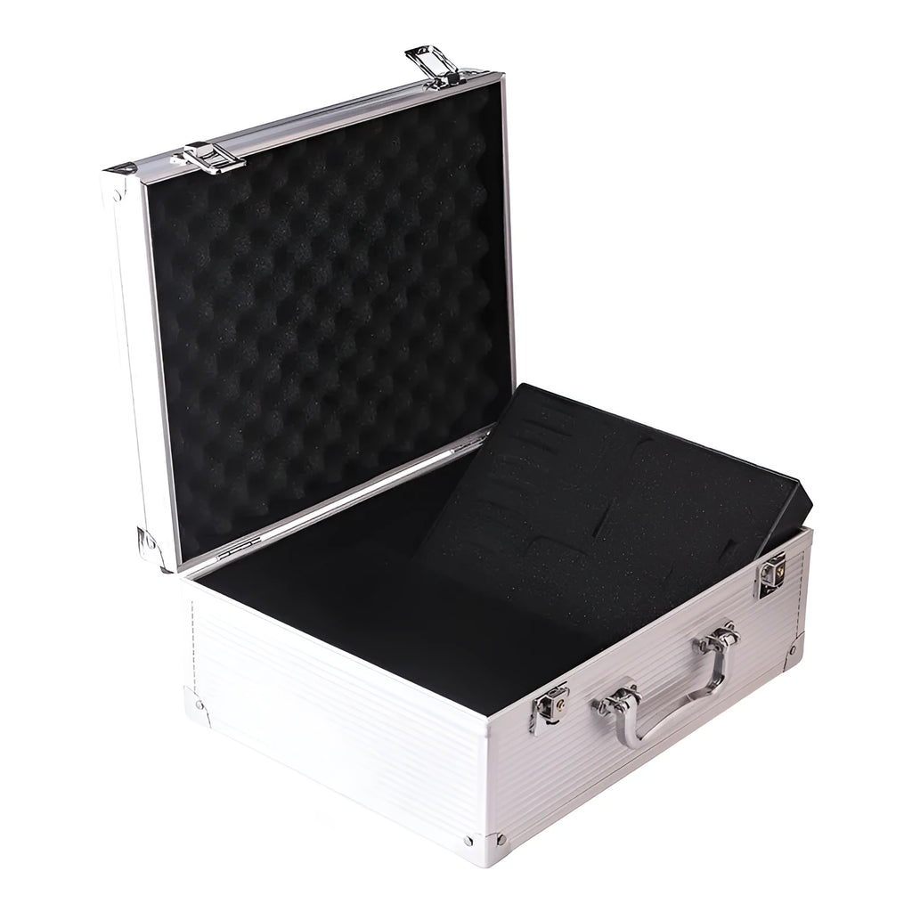 Black aluminium tattoo equipment case open, showing grey foam insert with custom-cut compartments for needles, inks, and machines.