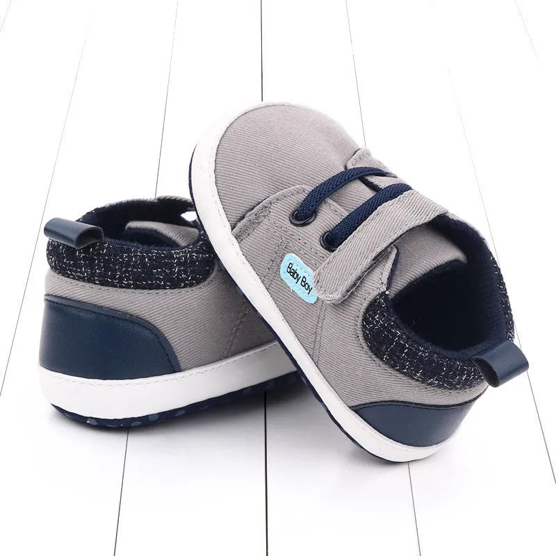 Cotton Velcro baby shoe for toddler boys in dark blue with non-slip sole and cartoon pattern