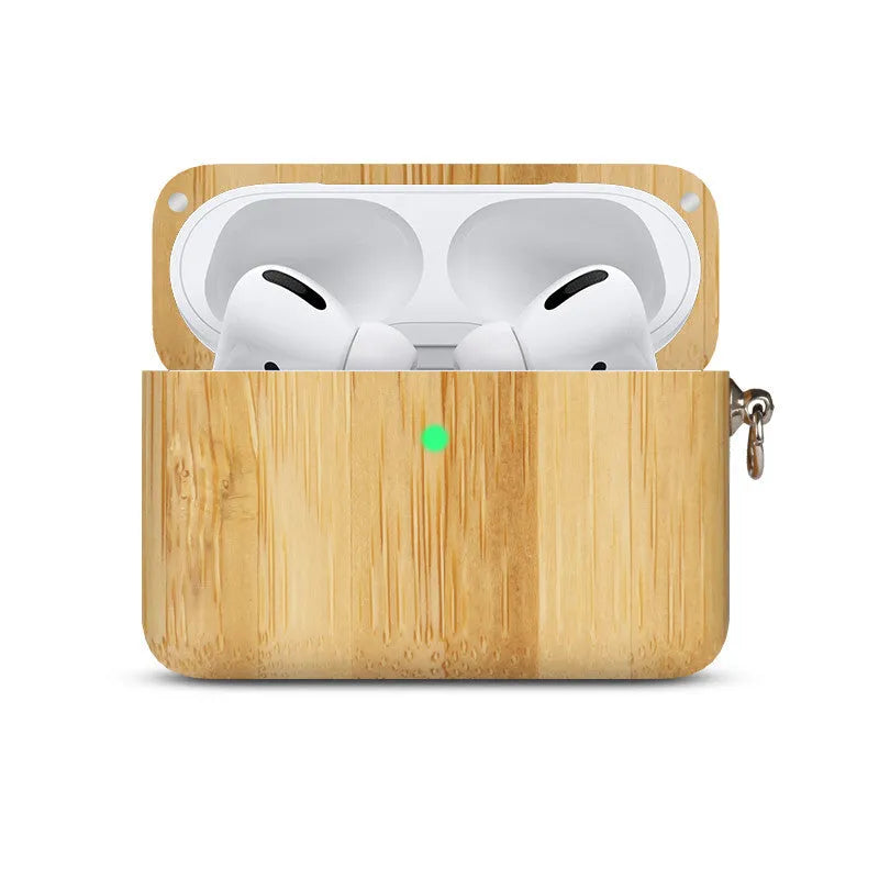 LZL solid wood earphone sleeve in walnut with attached lanyard, next to wireless earphones.