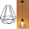 Black Nordic-style retractable iron chandelier hanging from a ceiling, showing its modern simple design.