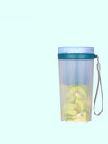 Portable pink electric juicer cup with USB charging port and pulp collection box