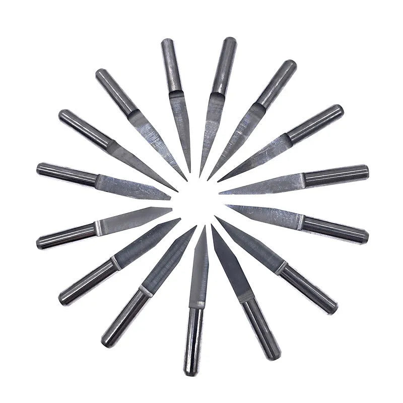 Ten tungsten steel engraving knives with sharp 45-degree tips for acrylic cutting, shown in packaging.