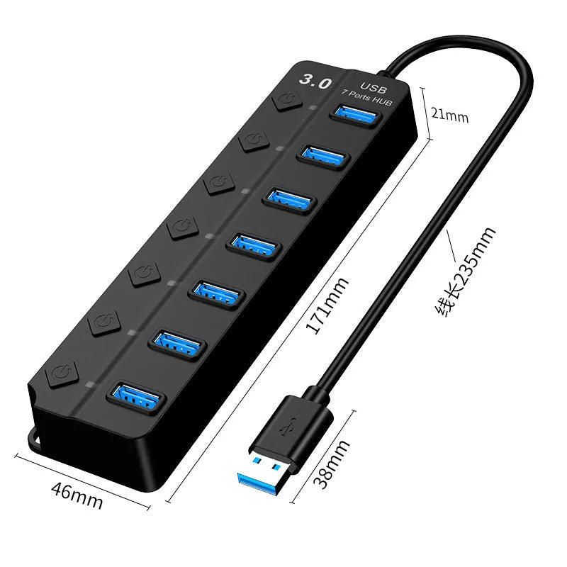 Black 7-port USB 3.0 hub with external power adapter and cable on a desk