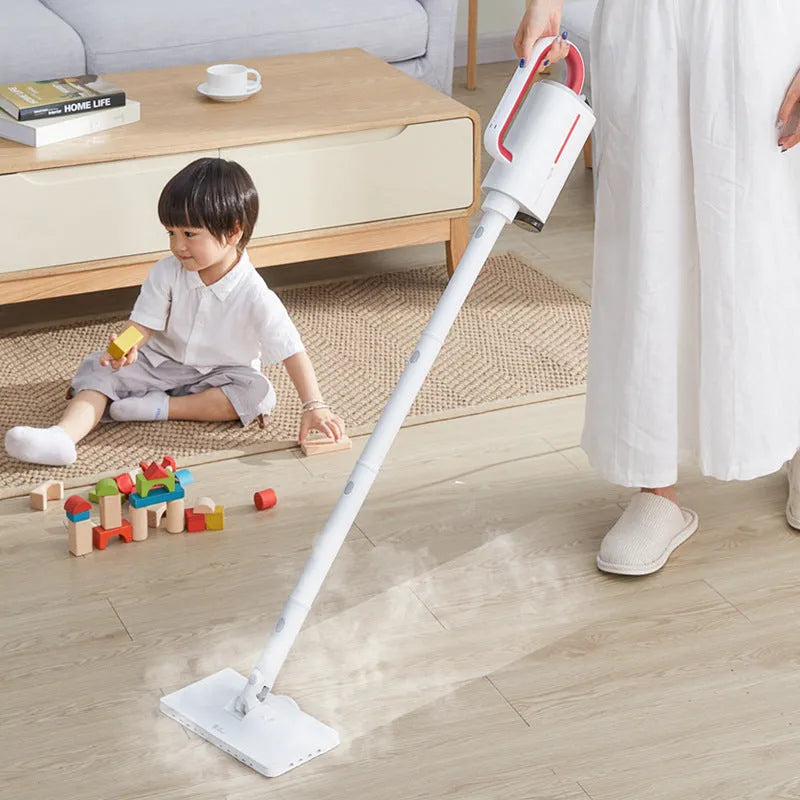 White Deerma ZQ610 steam cleaner main unit with five brush heads and connecting tubes laid out.