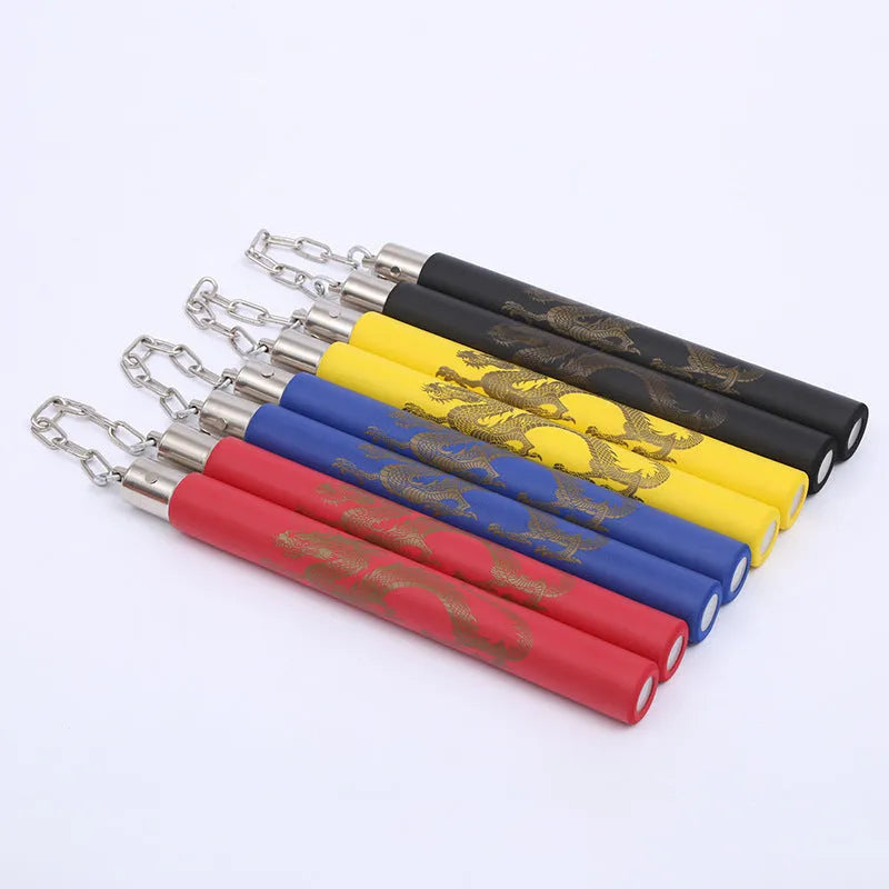 Red sponge nunchaku set showing two foam sticks connected by a metal chain, for martial arts training.