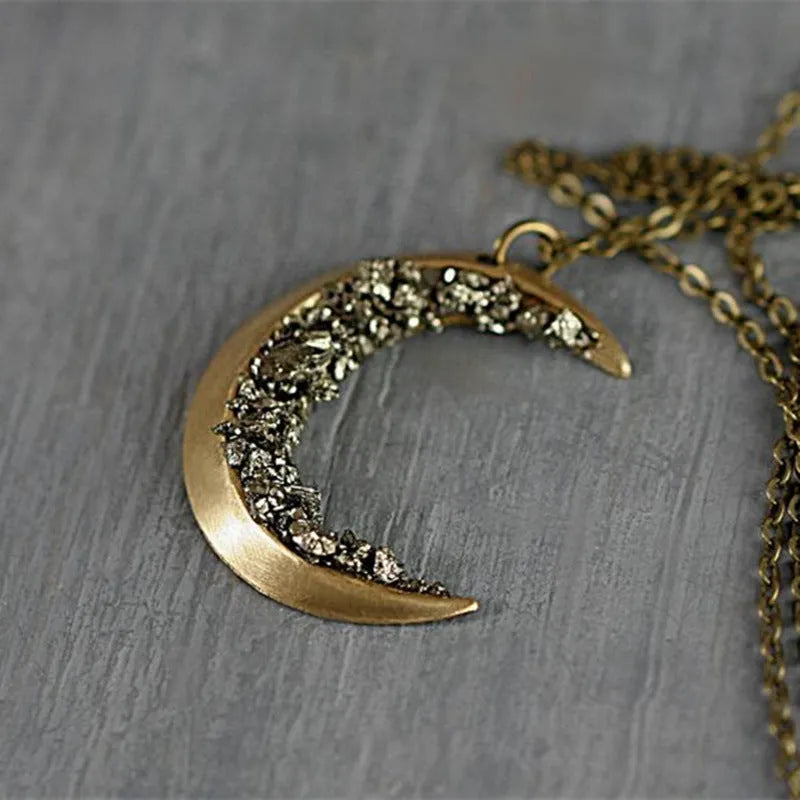 Ancient gold electroplated alloy crescent necklace with broken crystal pendant on 46cm chain