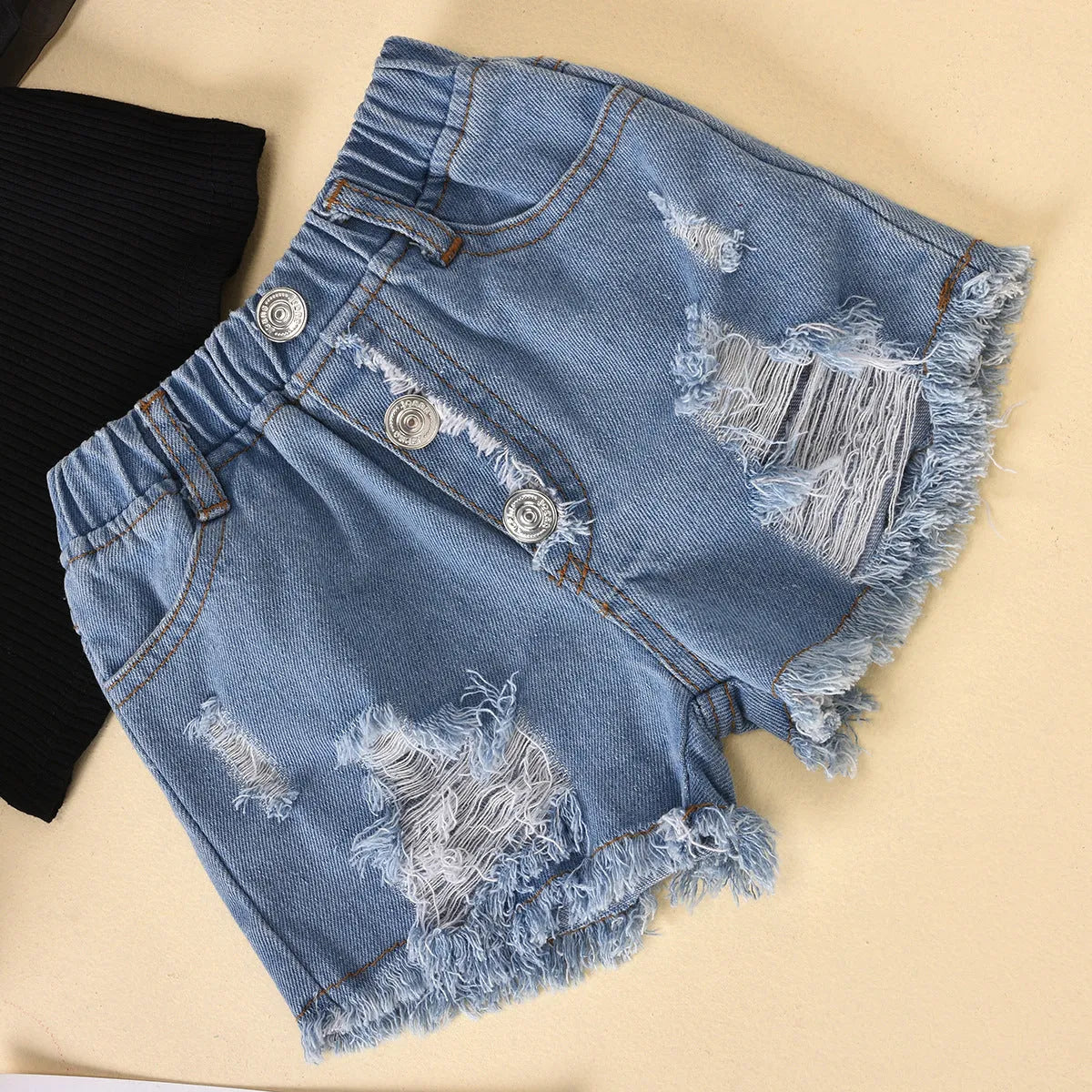 Black children's cotton suit with striped mesh-sleeve top and ripped denim shorts for ages 3-8.