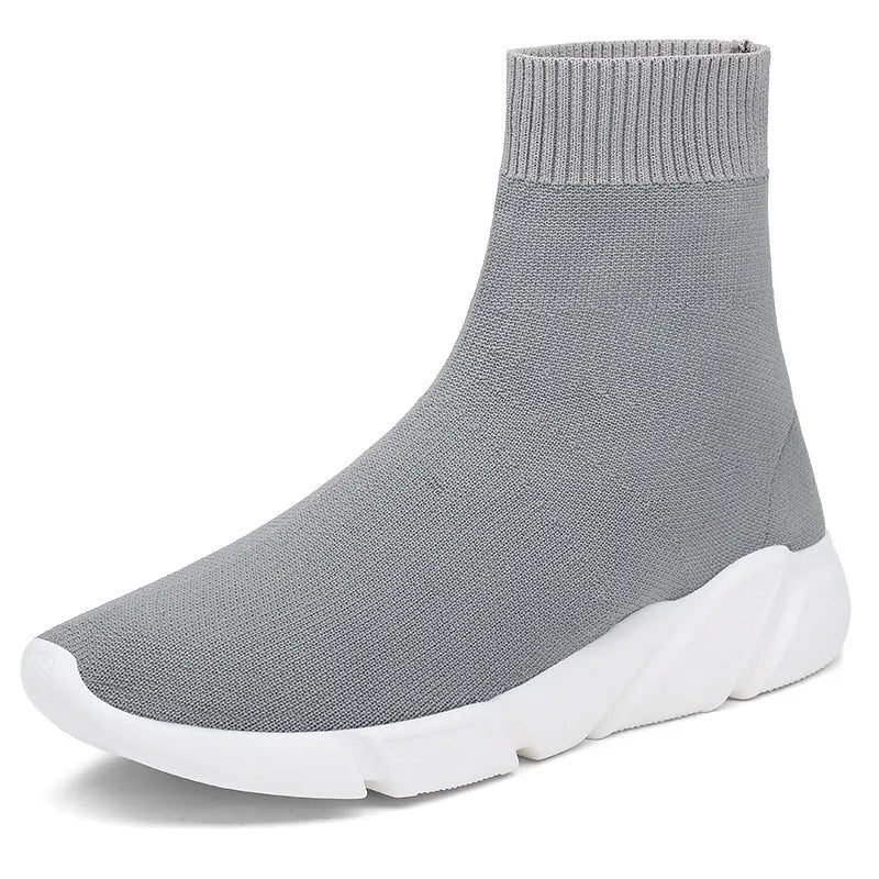 Pair of casual mesh slip-on shoes with flat heel and round toe, available in multiple colours