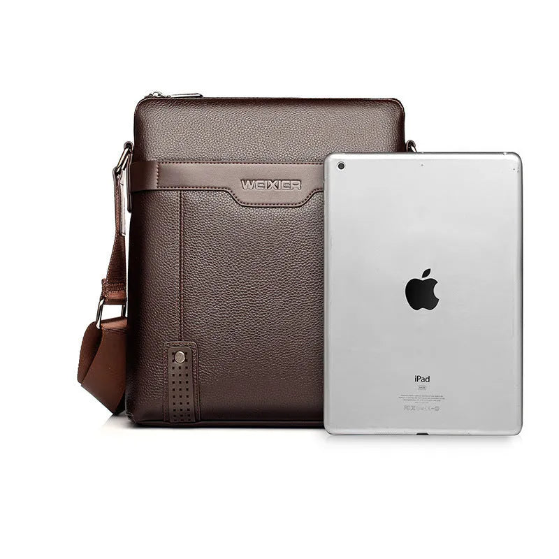 Black PU leather men's casual shoulder bag with zipper opening, shown in medium size.