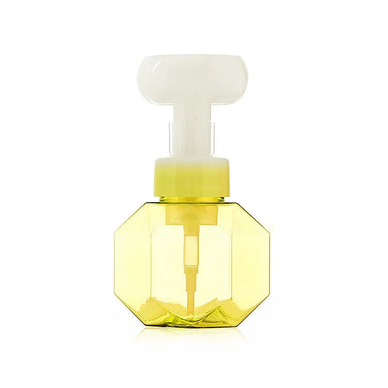 Empty plastic foam dispensing bottle in blue, green, pink or yellow colour.