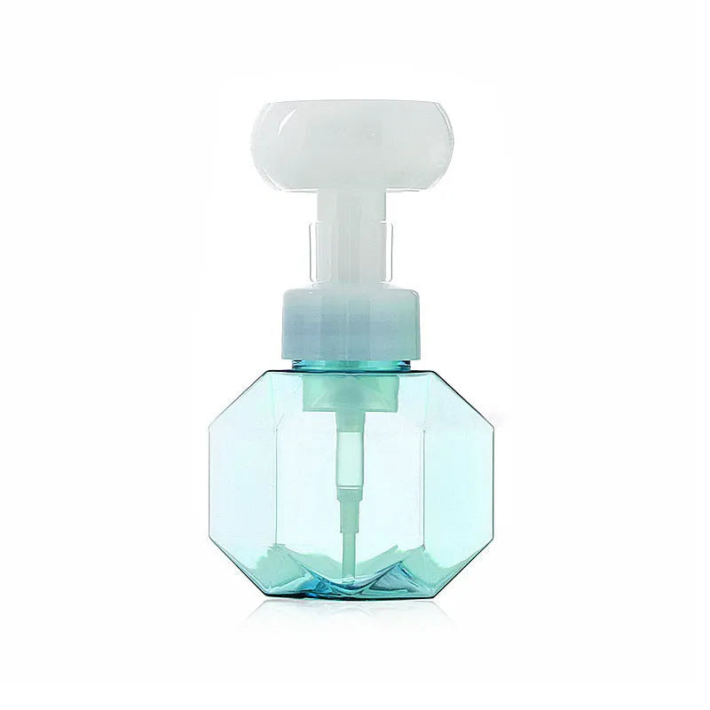 Empty plastic foam dispensing bottle in blue, green, pink or yellow colour.