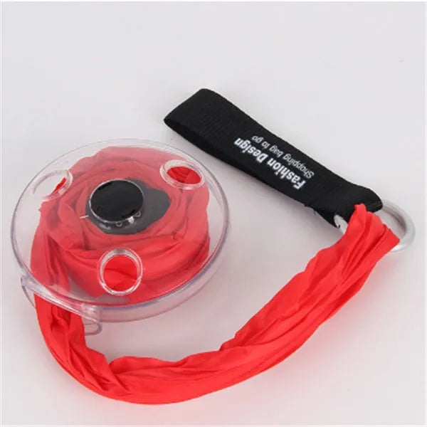 Disc folding portable shopping bag in red unfolded showing 33x40x10cm size with compact 10.5cm disc beside it
