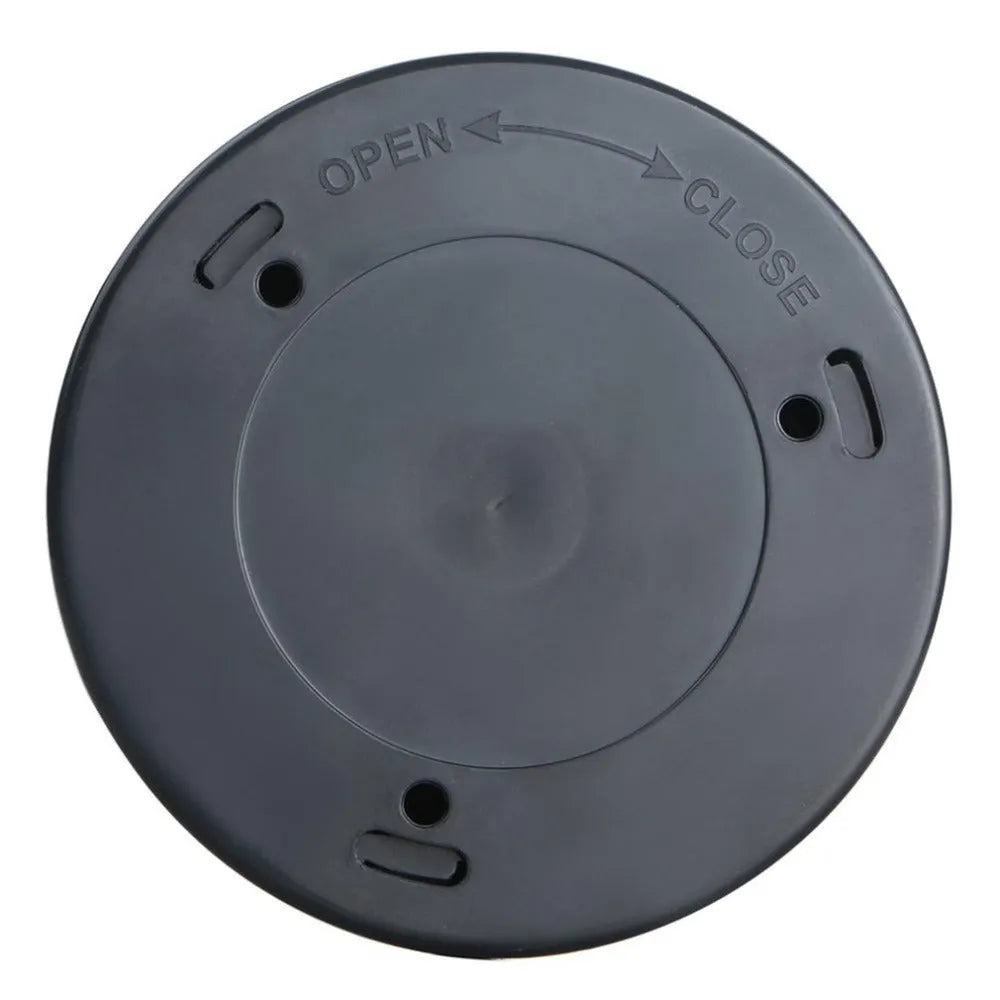 Square black wireless motion sensor night light on a surface, showing compact 80mm size.