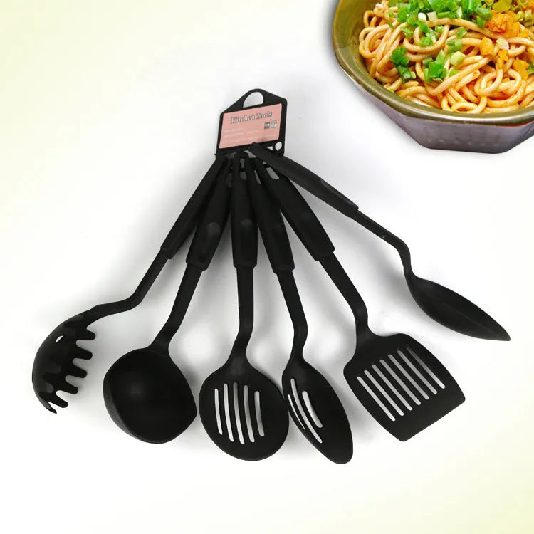 Black rubber kitchen utensil set with shovel and spoon for non-stick cookware