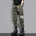 Men's outdoor sports trousers in green with small-foot leg and pocket detail, micro-elastic fabric, non-iron finish