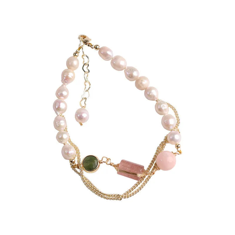 Women's pink freshwater pearl bracelet with geometric design and strawberry crystal charms