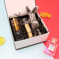 White square clamshell book gift box for lipstick cosmetics, 12x12x6cm size with lid open, on plain background