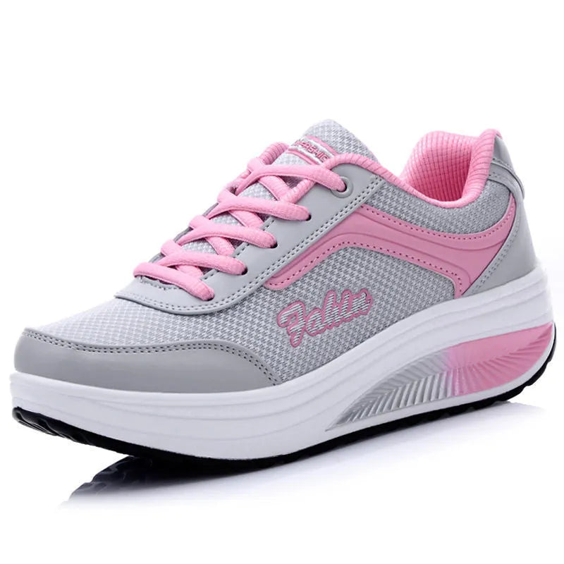 Women's heelless sports travel shoe in grey powder colour with a 3-5cm middle heel.