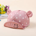 Baby baseball cap with short brim and dome top, available in five colours and sizes 6 months to 2 years.
