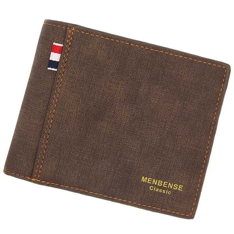 Men's tri-fold wallet in black showing multiple compartments for cards and cash storage