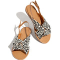 Women denim blue flat sandals with low heel beach slippers on casual setting