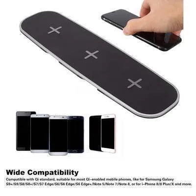 Black Qi wireless charging pad on desk charging smartphone