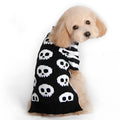 Black acrylic skull-patterned dog Halloween sweater on a small dog, sizes XXS to XL available