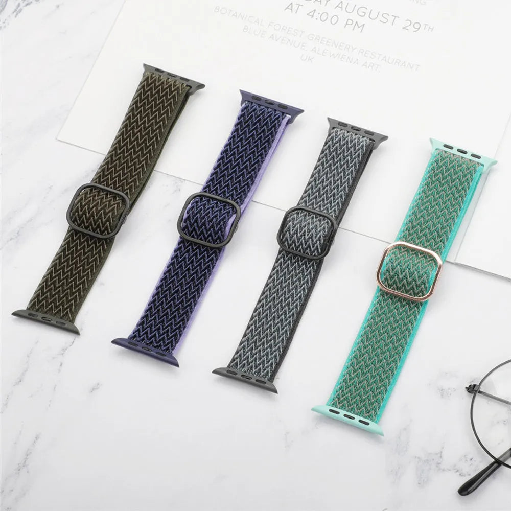 Braided nylon elastic strap for Apple Watch in wave pattern, showing adjustable fit on wrist.