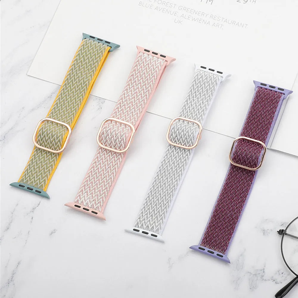 Braided nylon elastic strap for Apple Watch in wave pattern, showing adjustable fit on wrist.
