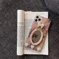 Brown marble pattern iPhone case with rhinestone bowknot and mirror detail