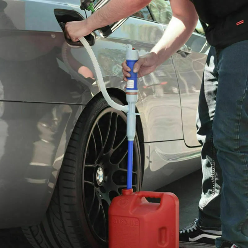 Blue and red manual plastic fuel transfer hand pump with tubing