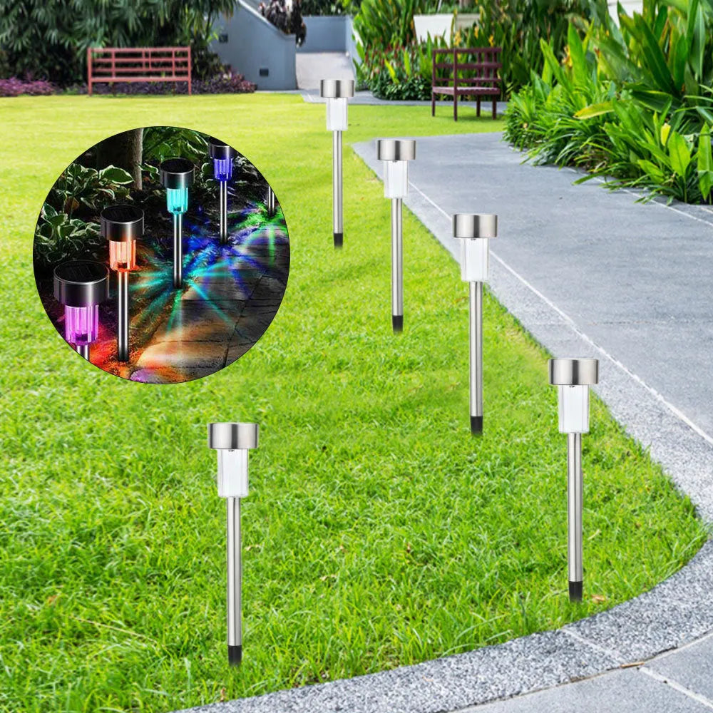 Stainless steel waterproof garden landscape light with LED illumination on a grassy surface.