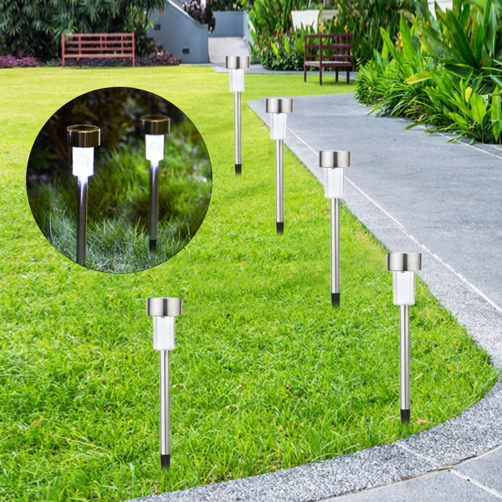 Stainless steel waterproof garden landscape light with LED illumination on a grassy surface.