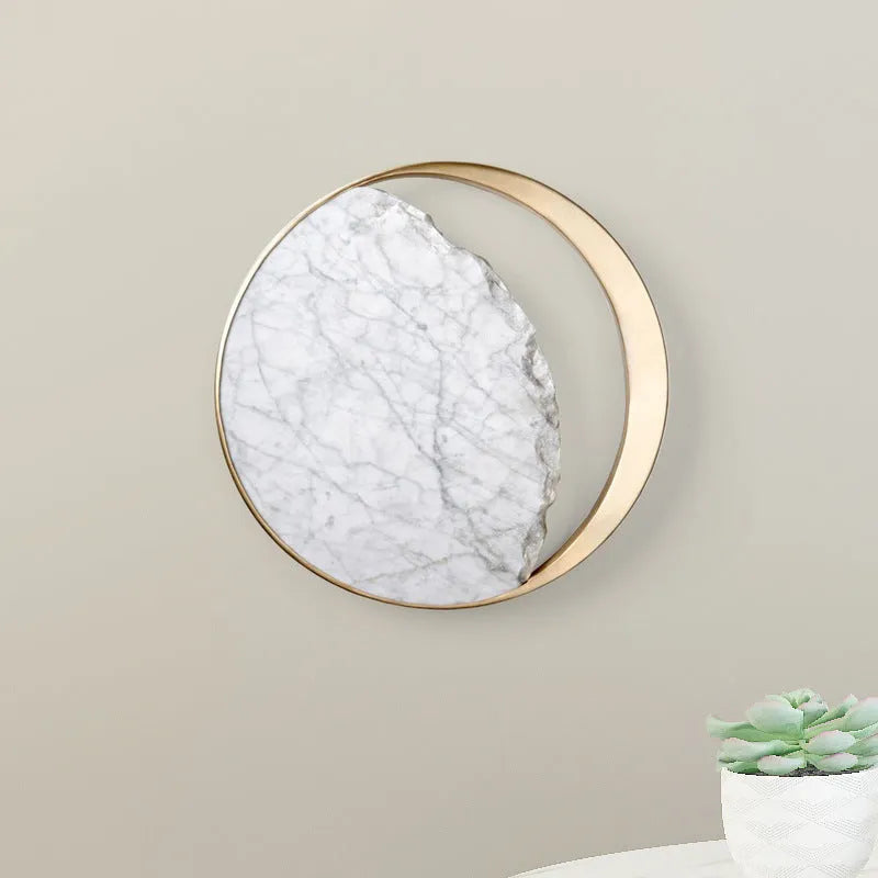 Round marble and copper eclipse art design LED wall lamp with a diameter of 25cm.
