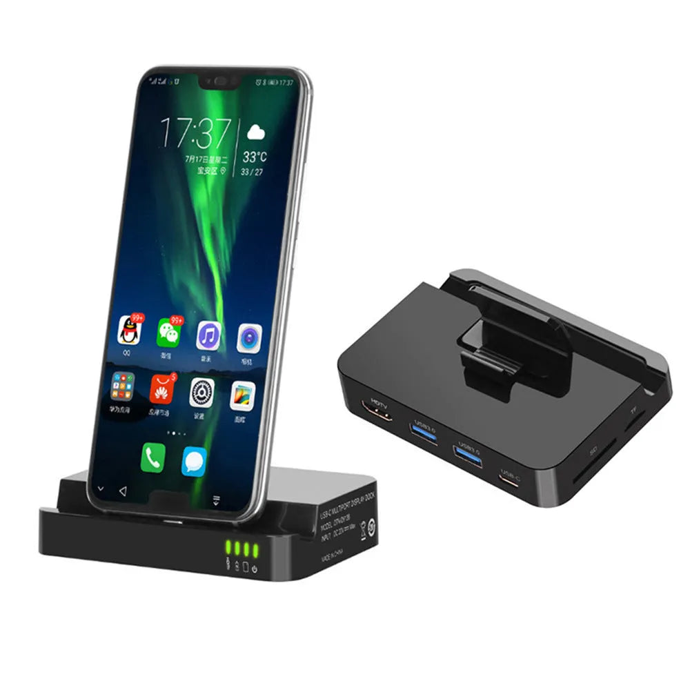 Black mobile phone dock converter with HDMI and USB ports on a wooden desk