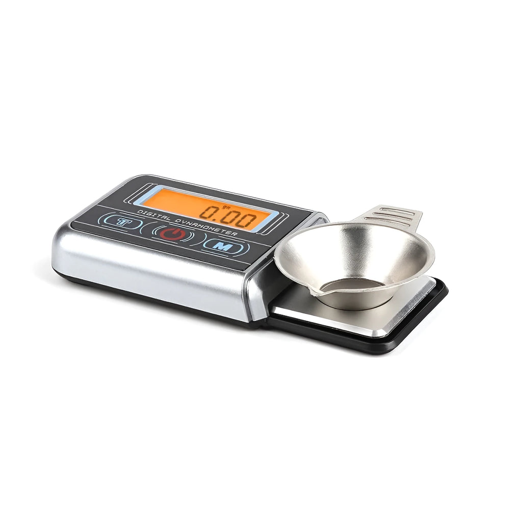 Electronic precision scale with digital display for weighing small items up to 100 grams.