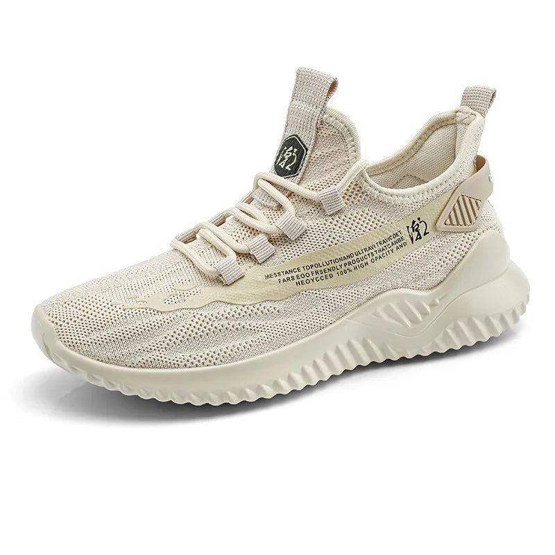 Men's low-top white mesh sports shoes with black rubber sole on a plain background