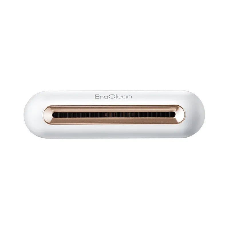 Rose gold USB car air purifier with activated carbon filter for deodorising and sterilising.