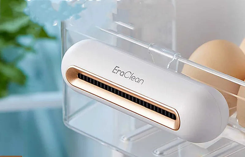 Rose gold USB car air purifier with activated carbon filter for deodorising and sterilising.