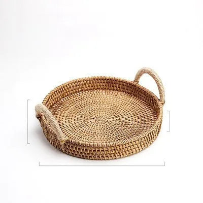 Round handwoven wicker basket with a wooden handle, shown in a natural colour