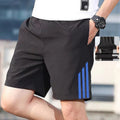 Men's three-bar sports shorts in cotton with geometric pattern, available in white blue green and red colours